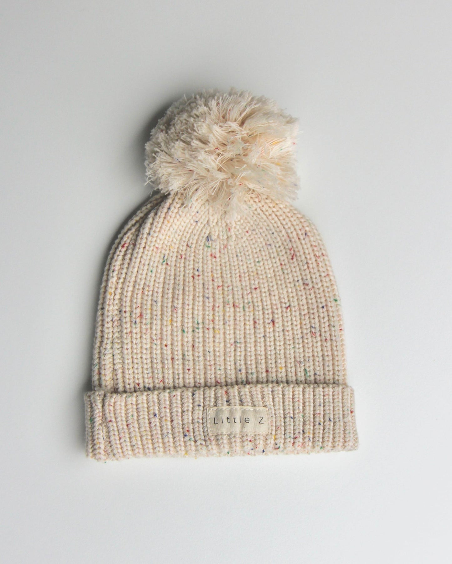 Baby Muts Gebreid met Pompon - Beige spikkel